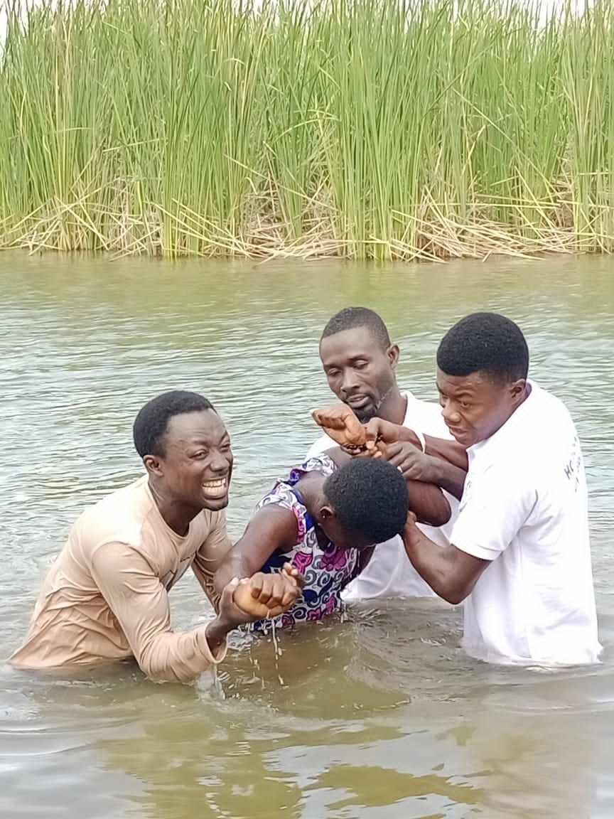 Baptism during a Hope Hills Mission ministry moment