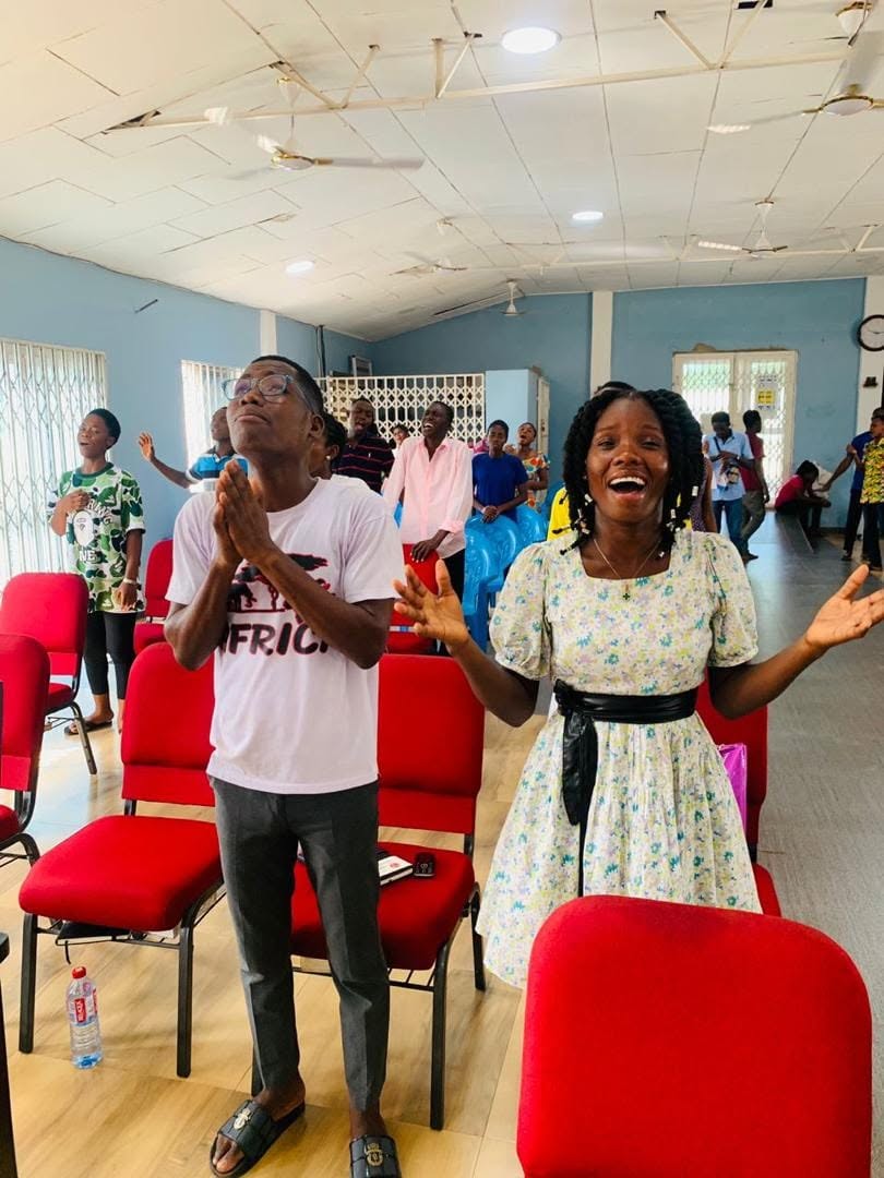 Participants worshipping during a Hope Hills Mission prayer gathering