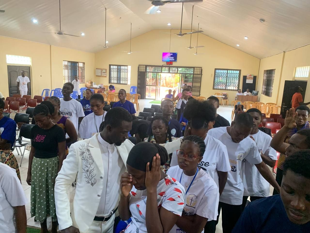 Prayer at a Hope Hills Mission gathering